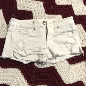 American Eagle white ripped jean shorts
